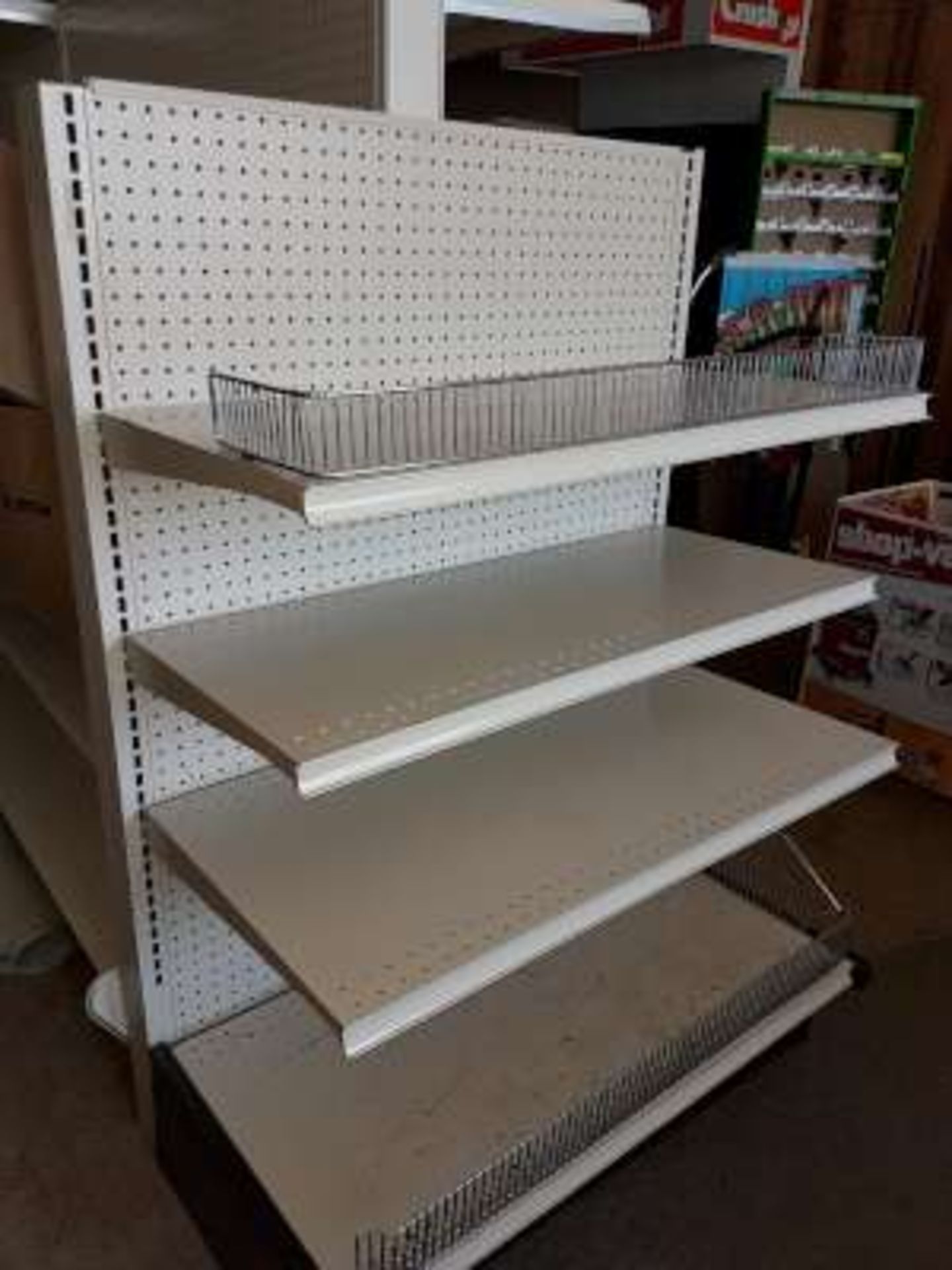 Metal shelving, 4 layers(54 1/2 in high x 38 in wide) located at the bunkend of the 16ft unit