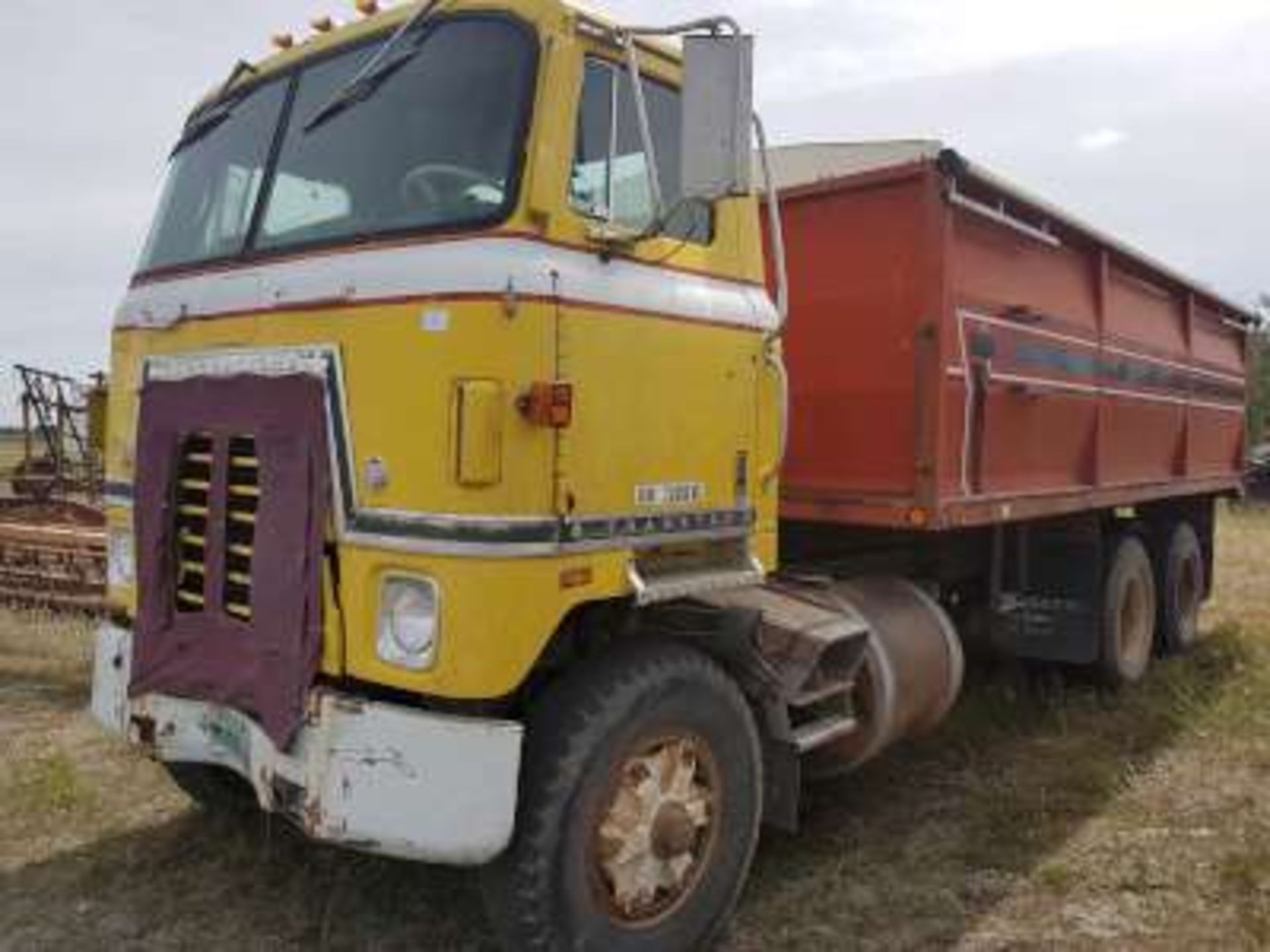 1975 International Cab-over Tandem grain truck, 20ft b&h w/ roll tarp, rebuilt engine with about