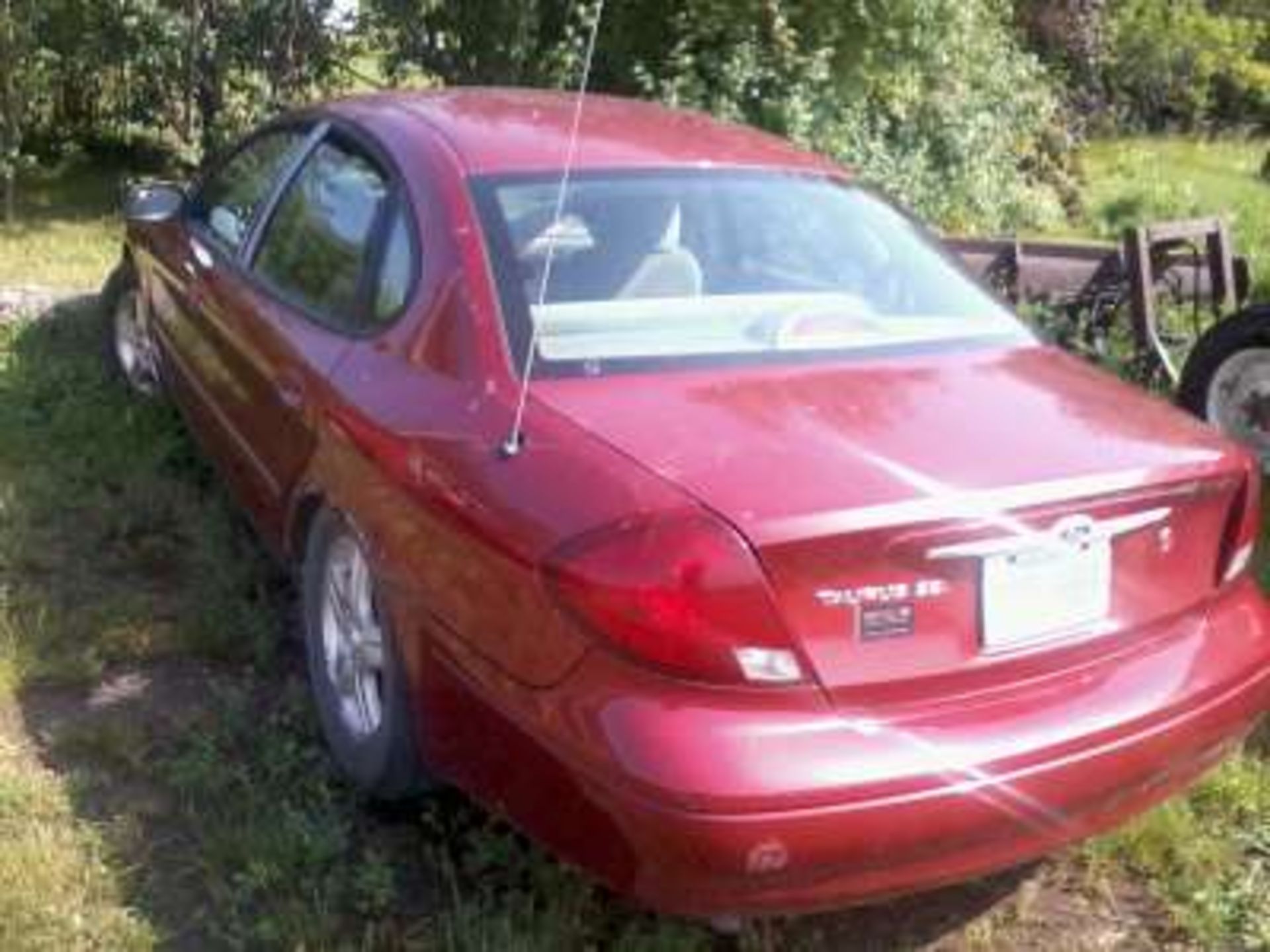 2000 Ford Taurus SE 4dr car, 299,490kms, a/c, pwr windows (new fan belt and new water pump) ( - Image 2 of 2