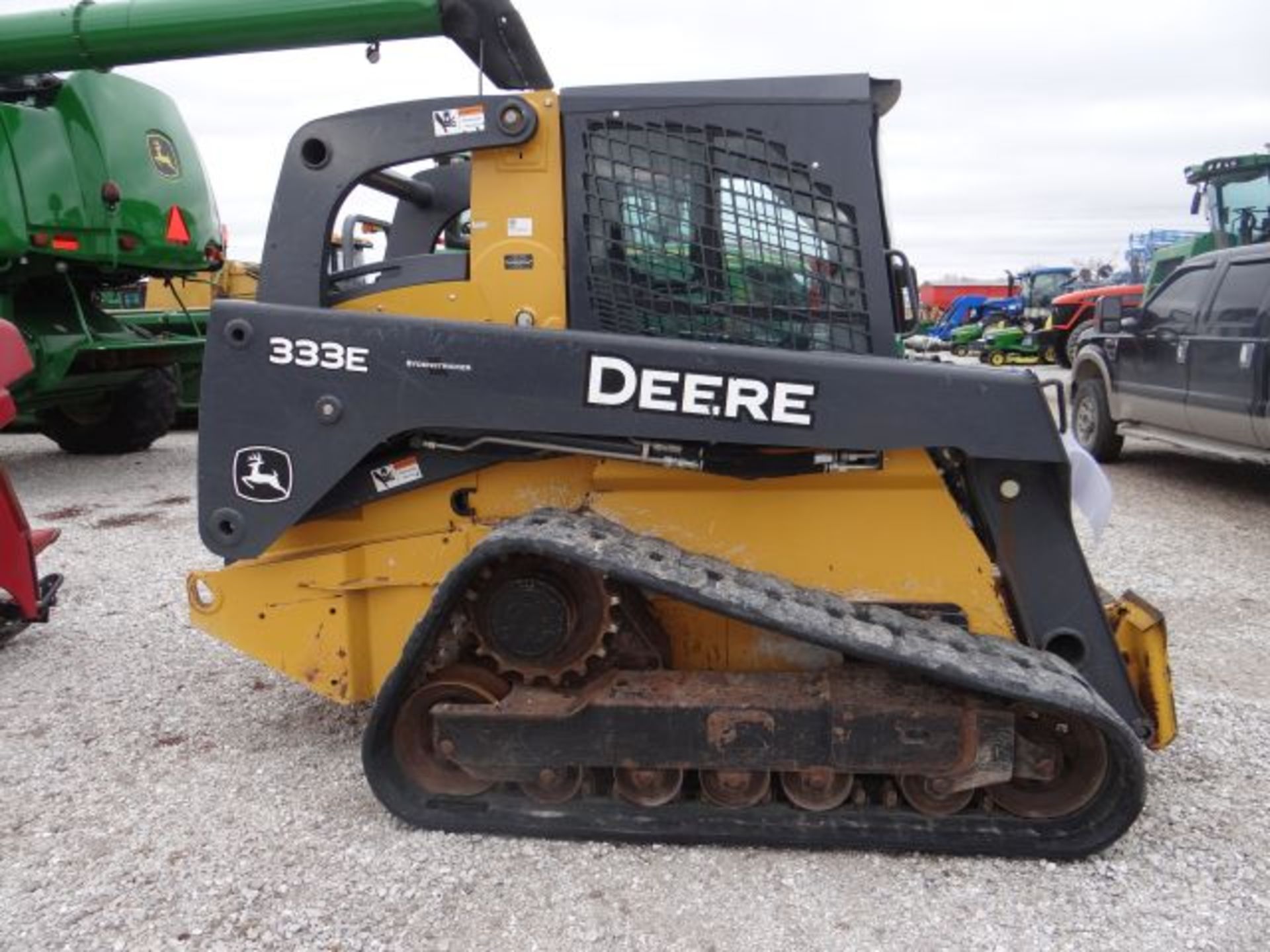 JD 333E Skid Steer, 2015 #64033, CTL, Cab w/ Ac and Heat, Switchable EH Foot-H-ISO Pattern