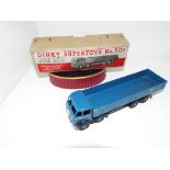 Dinky Supertoys - a Foden Diesel 8-wheel wagon # 501 dark blue, cab, body, chassis and ridged hubs,