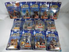 Star Wars - thirteen Star Wars action figures, all in original blister packs to include Chewbacca,