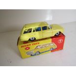 Dinky Toys - a Vauxhall Victor Estate Car # 141, yellow body, blue interior, spun hubs,