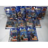 Star Wars - eleven Star Wars action figure and vehicle sets all sealed in original blister packs to