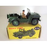 Dinky Toys - an Austin Champ # 674, with driver figure,