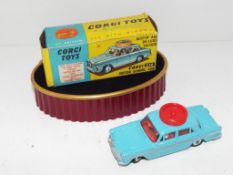 Corgi Toys - an Austin A60 De Luxe Saloon Corgi Motor School Car # 236 in light blue with silver