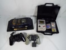 Nintendo - a Nintendo Gameboy in carry case with three games comprising Tetris,