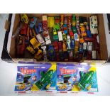 Diecast Models - A box containing a quantity of unboxed playworn diecast model motor vehicles to