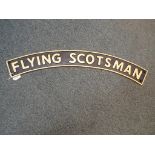 A cast iron sign entitled The Flying Scotsman, 11 cm (h) x 90 cm (w).