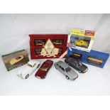 Diecast Models - a quantity of diecast model motor vehicles to include Burago Mercedes 180E 1:25