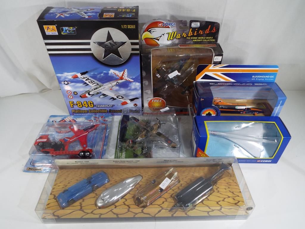 A quantity of boxed mint diecast model motor vehicles and aeroplanes to include Corgi,
