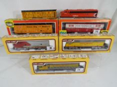 Model Railways - three boxed Life-like HO / OO diesel locomotives comprising Santa Fe,