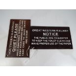 Two cast iron railway notices.