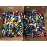 Diecast - two boxes containing a large quantity of unboxed diecast model motor vehicles to include