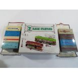 Two classic street cars, boxed and two blister packs by Jouet Haulage Freight Containers.