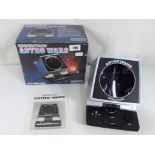 A 1980's electronic Astro Wars game by Grandstand in original box.