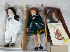 A Zapf Colette porcelain doll, boxed, an Alberon dressed doll,