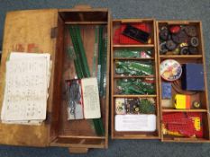 Meccano - A wooden box containing a quantity of vintage Meccano comprising plates, strips, motors,