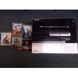 Playstation - a boxed Playstation 3 games console with one controller and five games to include