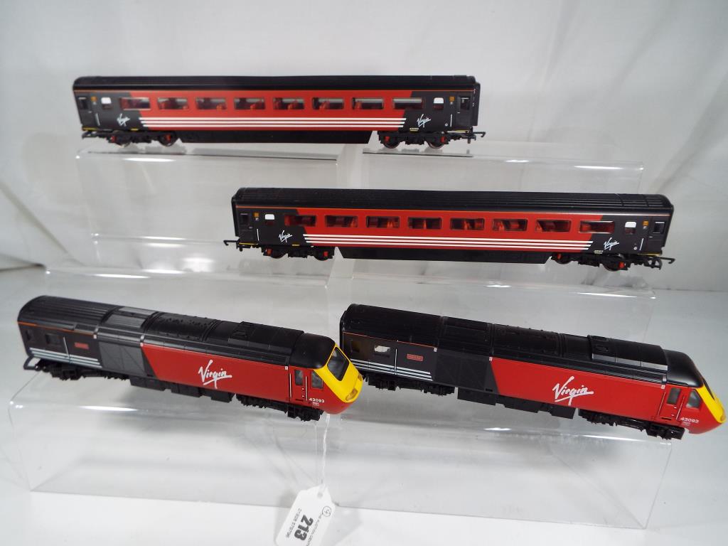 Model Railways - a Hornby Virgin four car unit comprising locomotive, dummy unit and two carriages,