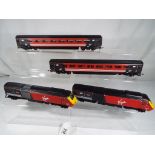 Model Railways - a Hornby Virgin four car unit comprising locomotive, dummy unit and two carriages,