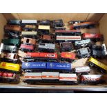 Model Railways - Approximately of thirty five OO gauge goods rolling stock, good.