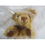 Steiff - a good quality Steiff teddy bear with button in the ear, original tags,