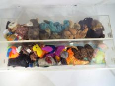 Ty Bears - two display cases containing a quantity of Ty Beanie babies (2)
