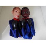 Two vintage boxing puppets in the style of Mohammed Ali and Howard Cosell (sportscaster)