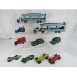 Dinky Toys - two Bedford tractors with Pullmore Car Transporters # 582 blue and marked 'Dinky Toys