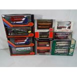 Diecast - twelve diecast model motor vehicles all contained in original packaging to include