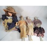 Dolls - three porcelain dressed dolls in a 1920's style and a porcelain doll in a seated position