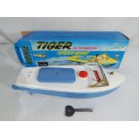 Sutcliffe Models - A Sutcliffe Models 'Tiger' clockwork speedboat with light blue hull, white deck,