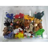 Ty Bears - A display case containing a quantity of Ty Beanie Babies.