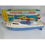 Sutcliffe Models - A Sutcliffe Models 'Kestrel' electric cruiser, light blue hull and engine cover,