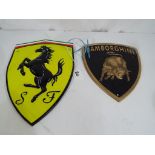Two cast iron advertising wall plaques, largest plaque 30 cm x 20 cm,