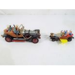 A vintage Corgi Chitty Chitty Bang Bang model and a further Chitty Chitty Bang Bang by Husky Models,