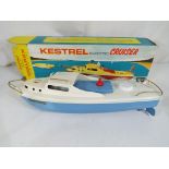 Sutcliffe Models - A Sutcliffe Models 'Kestrel' electric cruiser, light blue hull and engine cover,