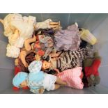 Dolls - a box containing approximately 35 dolls predominantly souvenir dolls and similar