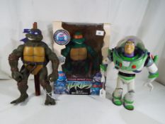 A Teenage Mutant Ninja Turtle by Playmates entitled Giant Michelangelo in original box,