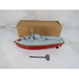 Sutcliffe Models - A Sutcliffe Models 'Fury' tinplate clockwork Torpedo Boat, red hull,