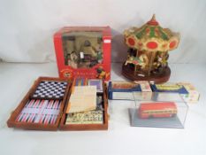 A good mixed lot to include a model of a carousel,