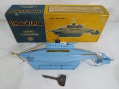 Sutcliffe Models - A Sutcliffe Models 'Unda - Wunda' tinplate clockwork diving submarine in light