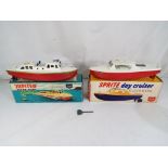 Sutcliffe Models - Two Sutcliffe model boats comprising a 'Sprite' tinplate clockwork Day Cruiser,