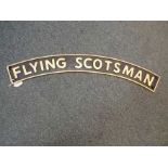 A cast iron sign entitled The Flying Scotsman, 11 cm (h) x 90 cm (w).