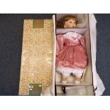 Dolls - a good quality porcelain dressed doll with glass eyes and open mouth from The Leonardo