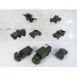 Dinky Toys - eright diecast military vehicles comprising Army wagon with driver figure # 623,