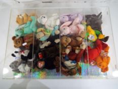 Ty Bears - A display case containing a quantity of Ty Beanie Babies.