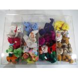 Ty Bears - A display case containing a quantity of Ty Beanie Babies.