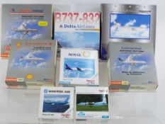 Herpa - a collection of eight boxed model aircraft in various scales,